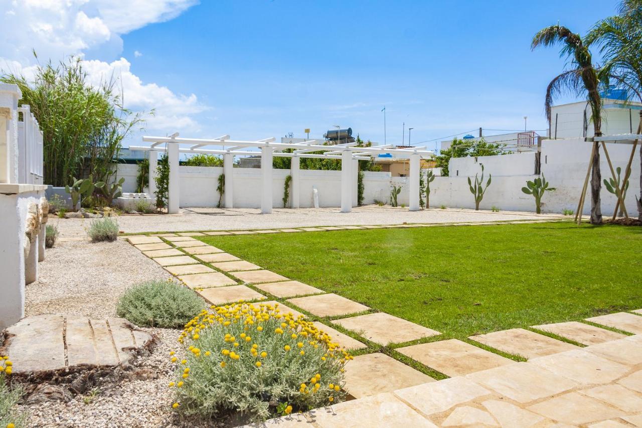 Trullo E Appartamenti Al Mare Торре-Сан-Джованни-Удженто Экстерьер фото